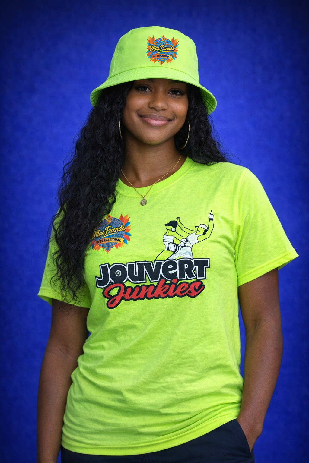 Person wearing a bright green 'Jouvert Junkies' t-shirt and bucket hat against a blue background
